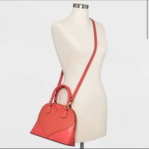 A new day heart shaped satchel